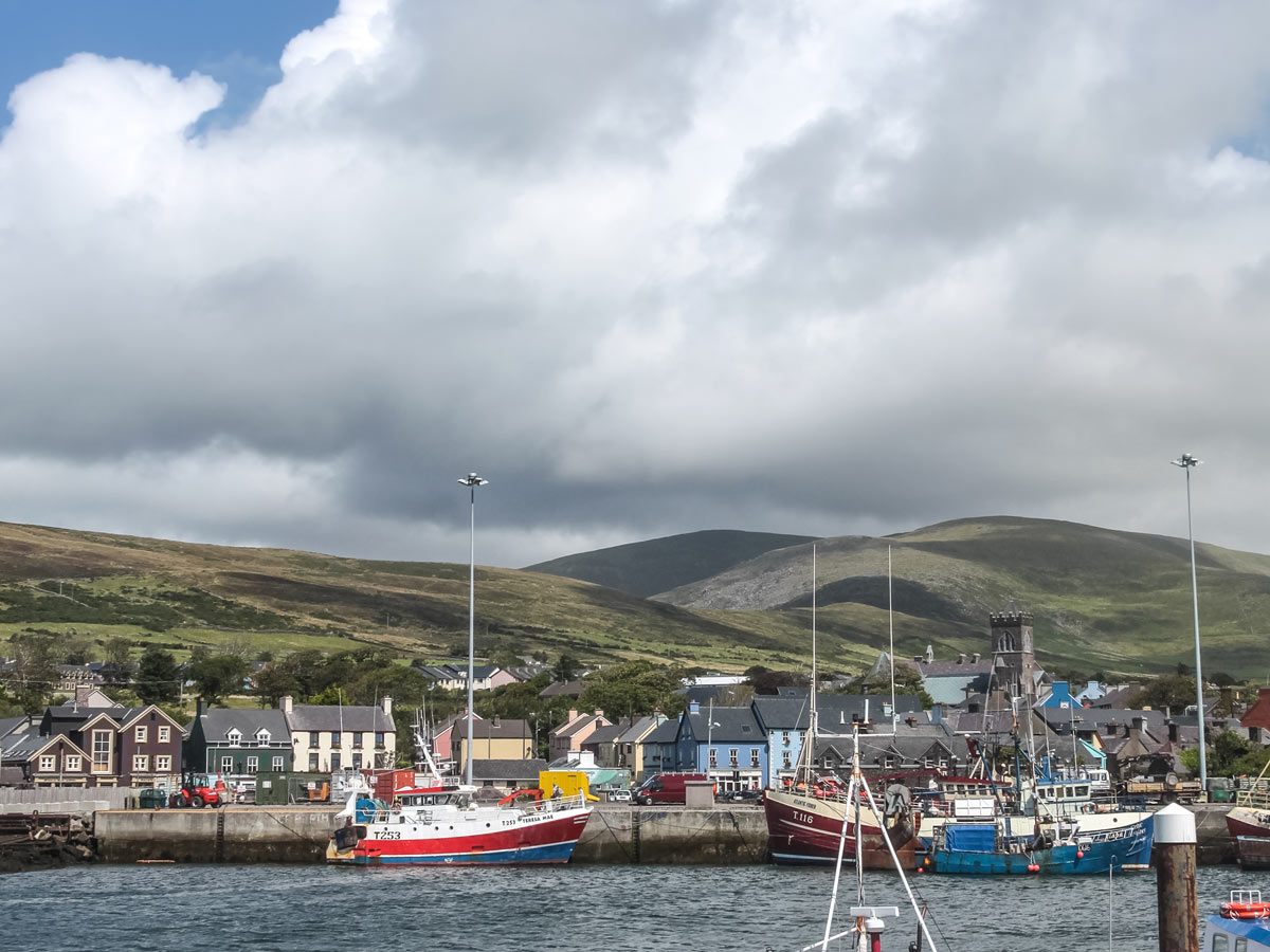 View of Dingle town in Ireland from the harbour. Dingle is one of the stops on one of the best hiking trails, the Dingle Way